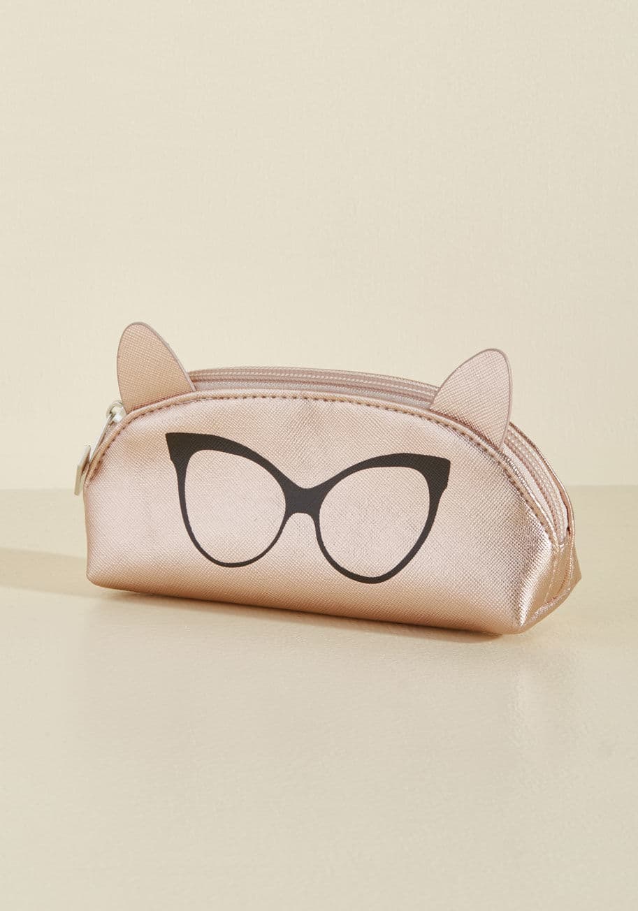 P.CatEar-04-RoseGold-0562 - Fetching your spectacles will feel special every time you pull this faux-leather glasses pouch from your purse! Screen printed with black cat-eye glasses and topped with adorable ears, this metallic rose gold case by PERVERSE sunglasses - boasting a hint 