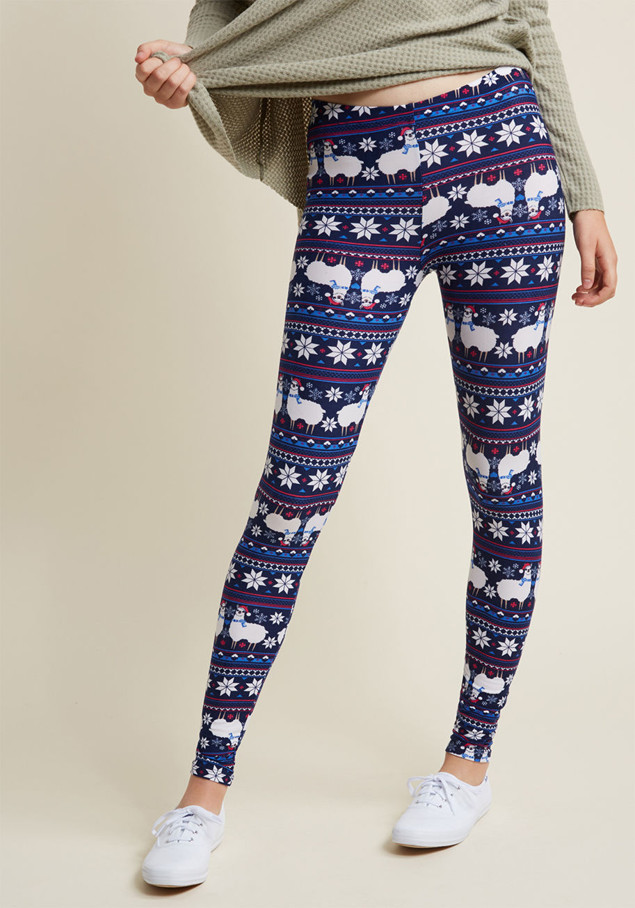 PR202807 - Take these navy blue leggings out caroling, or curl up with them by the fire - either way, your holiday spirit can't be contained! Made touchably soft with brushed-knit fabric and given a sprinkling of quirk with a llama-detailed Fair Isle print, this pai