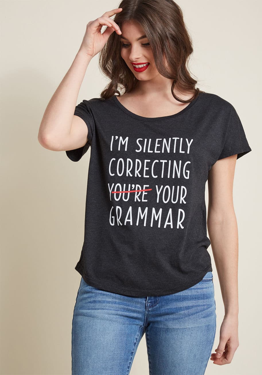 Silently Correcting - While you keep your linguistic talents sharp, this grey graphic tee lets everyone know exactly what you're up to! Encouraging accurate speech patterns through a ModCloth-exclusive screen print, this relaxed-fit T-shirt is a tribute to your articulate awar