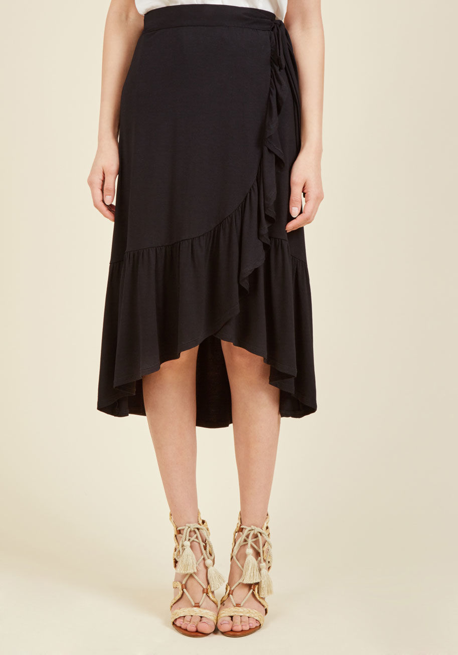 SL70178 - Secure this black wrap skirt's ties sweetly at your waist and float through your day with your delightfulness on full display! You'd never know from its high-low hem and ruffled trim, but this ModCloth-exclusive skirt boasts a soft jersey knit, making it 