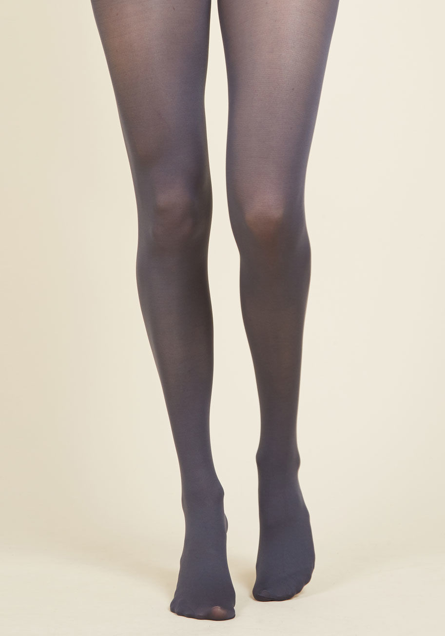 SOLID PEWTER TIGHTS - Enjoying your favorite warm-weather clothes year 'round is a cinch now that you've welcomed these dark grey tights into your wardrobe! In a versatile shade, these semi-sheer stockings provide a gamine-chic layer under all your fave outfits!