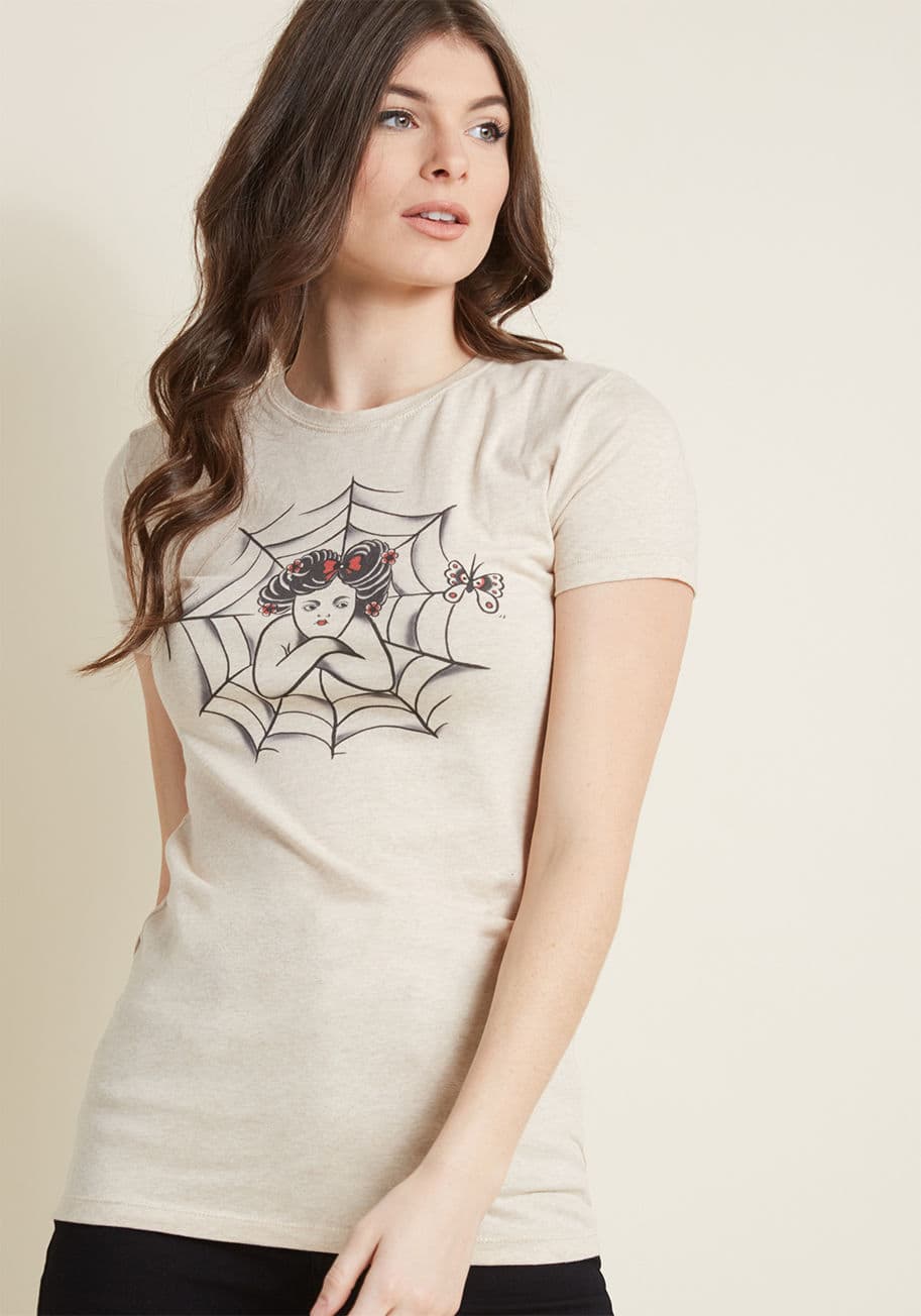 SPIDER LADY - One lady's longing is another's lovely style! The tattoo-inspired spider queen screen printed on this fitted T-shirt is waiting and waiting for the arachnid of her dreams to come along! Looking gloomily over at the butterfly that also lives on this heathe