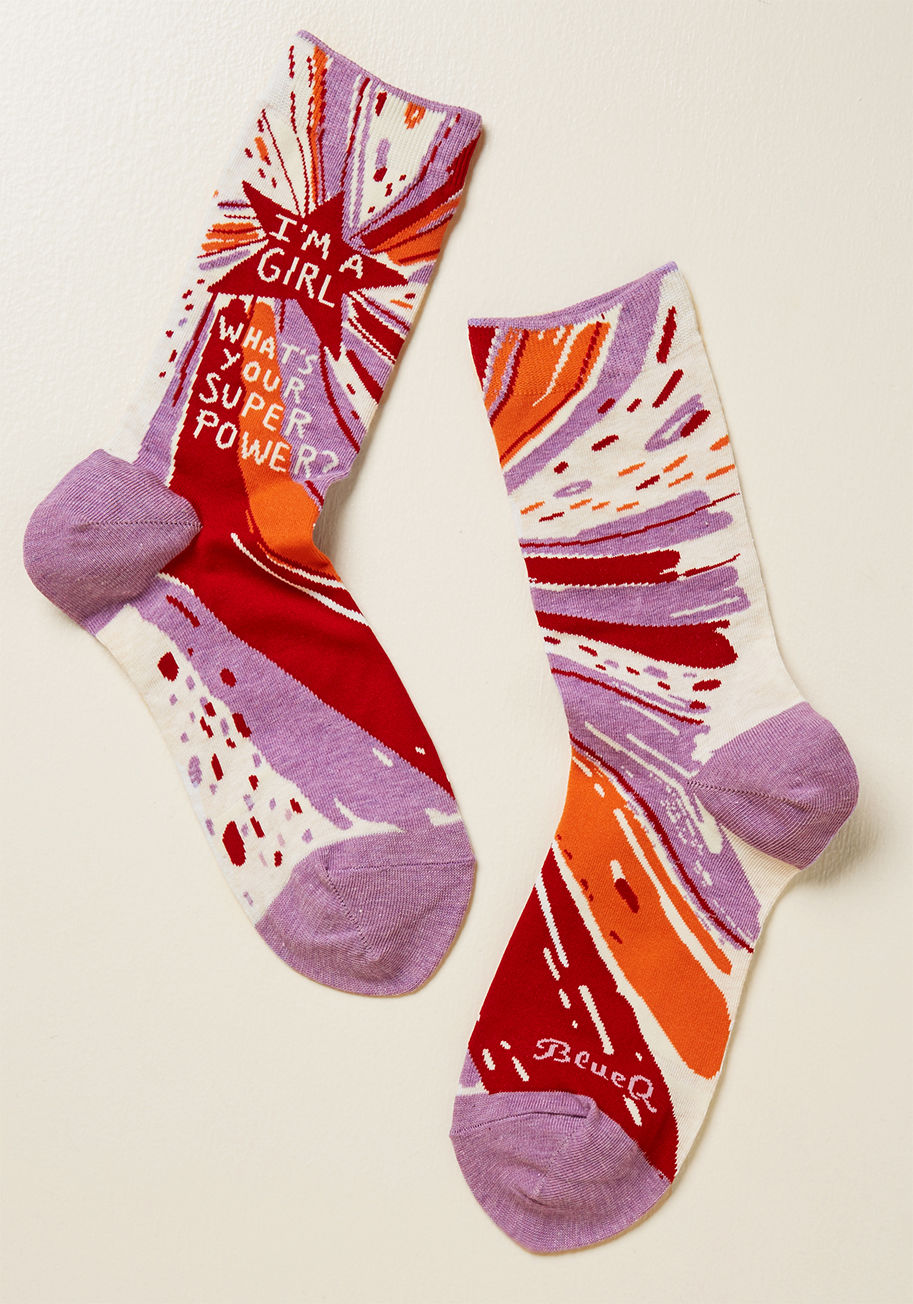 SW490 - There are tons of ways to showcase your inner strength, but we believe flaunting these colorful socks is the most fashionable option! While swirls of white, purple, red, and orange provide this pair with eye-catching appeal, it's the message of empowermen