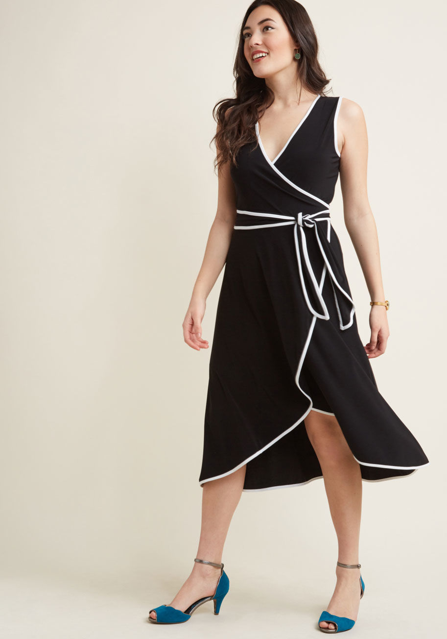 T1045 - There's nothing like a classic look with an eye-catching accent to encourage your confidence! This black midi dress employs bright white piping to highlight its wrap-inspired bodice, skirt, and sash, encouraging everyone to notice your winning outfit - an