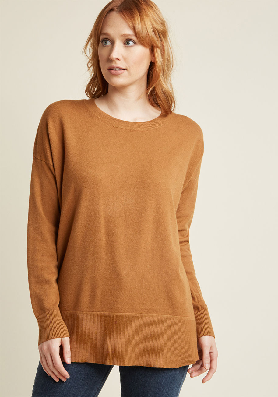 T2220 - Your challenge? Create a look that's comfy, cuddly, and downright cozy. The solution? This tan pullover, obviously! Lightweight knit fabric and an inviting, oversized fit make this sweater an optimal layering piece, so consider the obstacle of crafting th