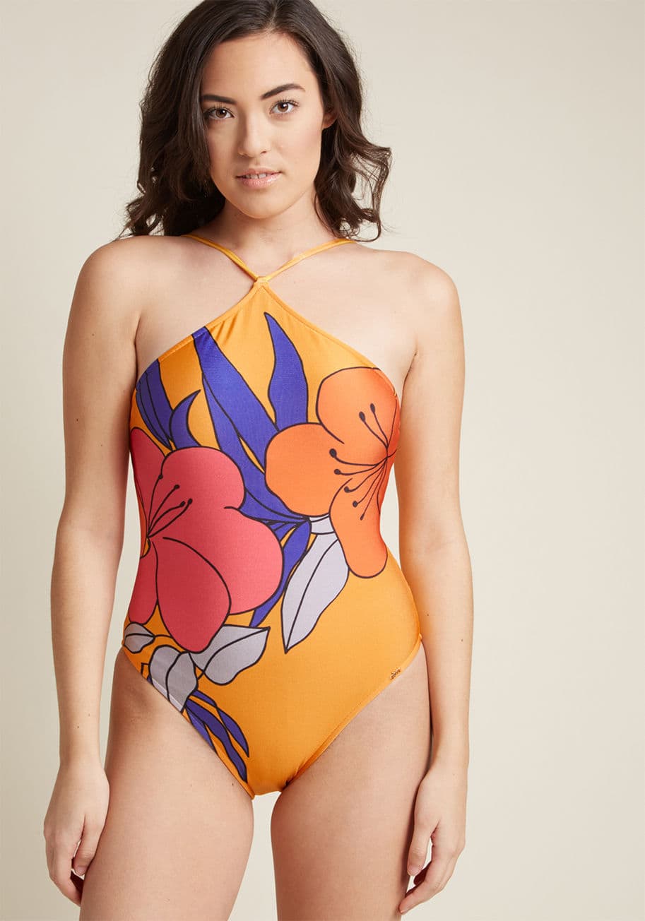 V18M0202 - Basking at the beach has never been as lovely as it is while wearing this tangerine-yellow, one-piece swimsuit. Embodying the bright hues and relaxed attitude of the tropics, this swimwear features adjustable straps that meet at the neckline, and a vibran