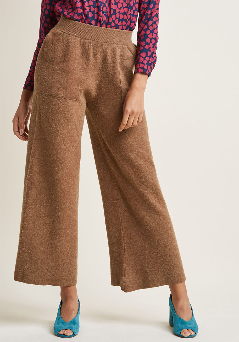 WI17DEJ07 - In these wide-leg pants, panache tags along wherever you go. Comfort comes along, too! Crafted from a soft, thick stretch knit with a versatile brown tone, these classy patch-pocketed pants by Compania Fantastica are part of your plan to merge fashion and