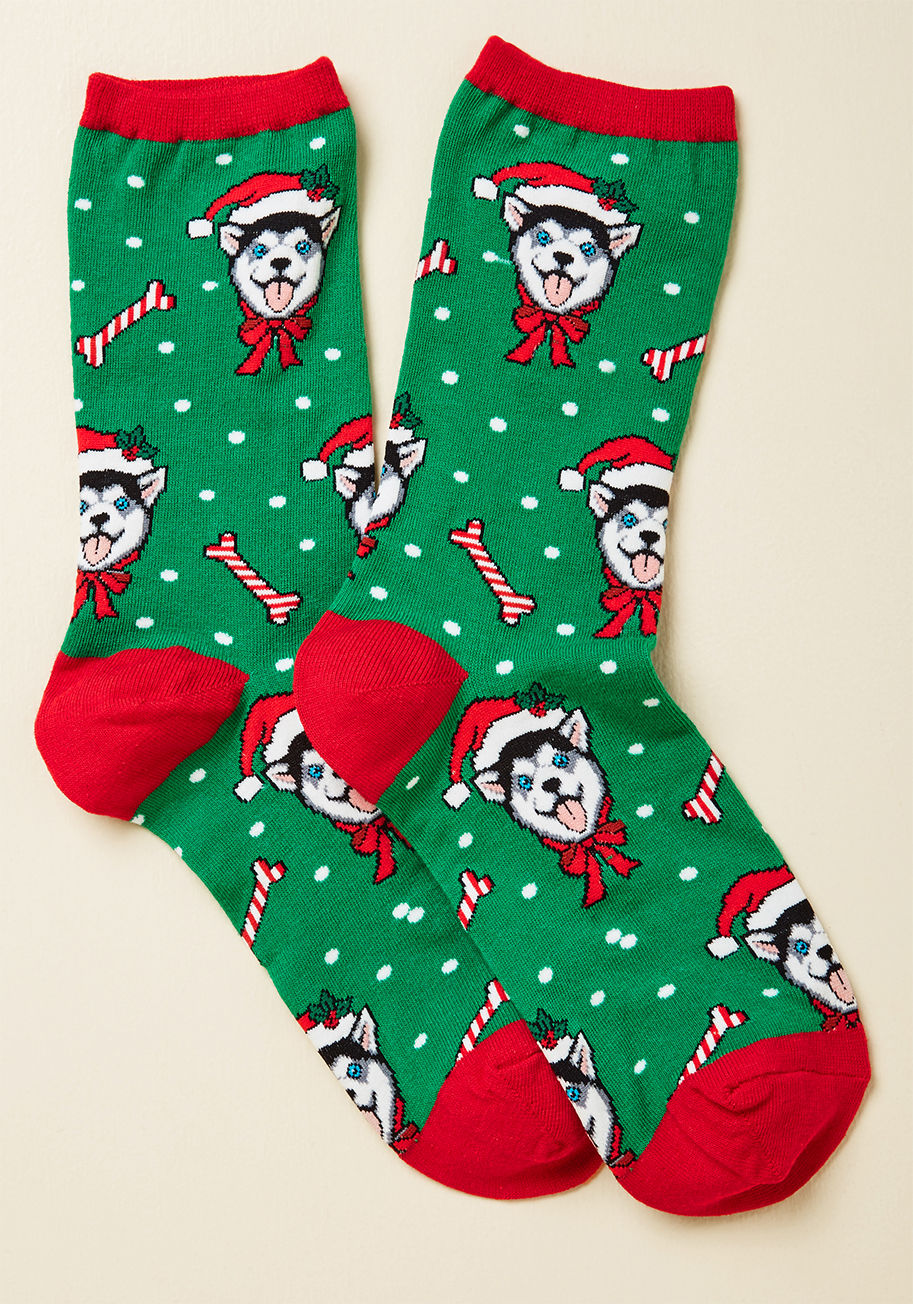 Wnc511 - What's soft, sweet, and brings a smile to your face? These husky-printed socks, of course! Detailed with red trim, peppermint bones, white snowy dots, and a bright green background hue, this pretty pair is just what you need to put some 'pup'