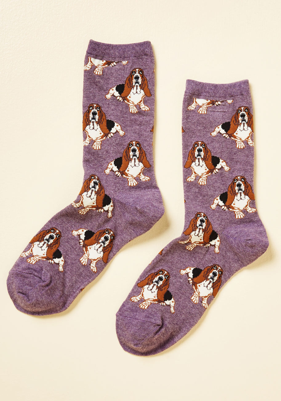 Wnc878 - It's time to take these purple socks on a stroll so the whole neighborhood can get a good gawk! Patterned with black, white, and brown hound dogs and rising to a cool half-height, these quirky socks will sniff out like-minded stylistas like it's what they