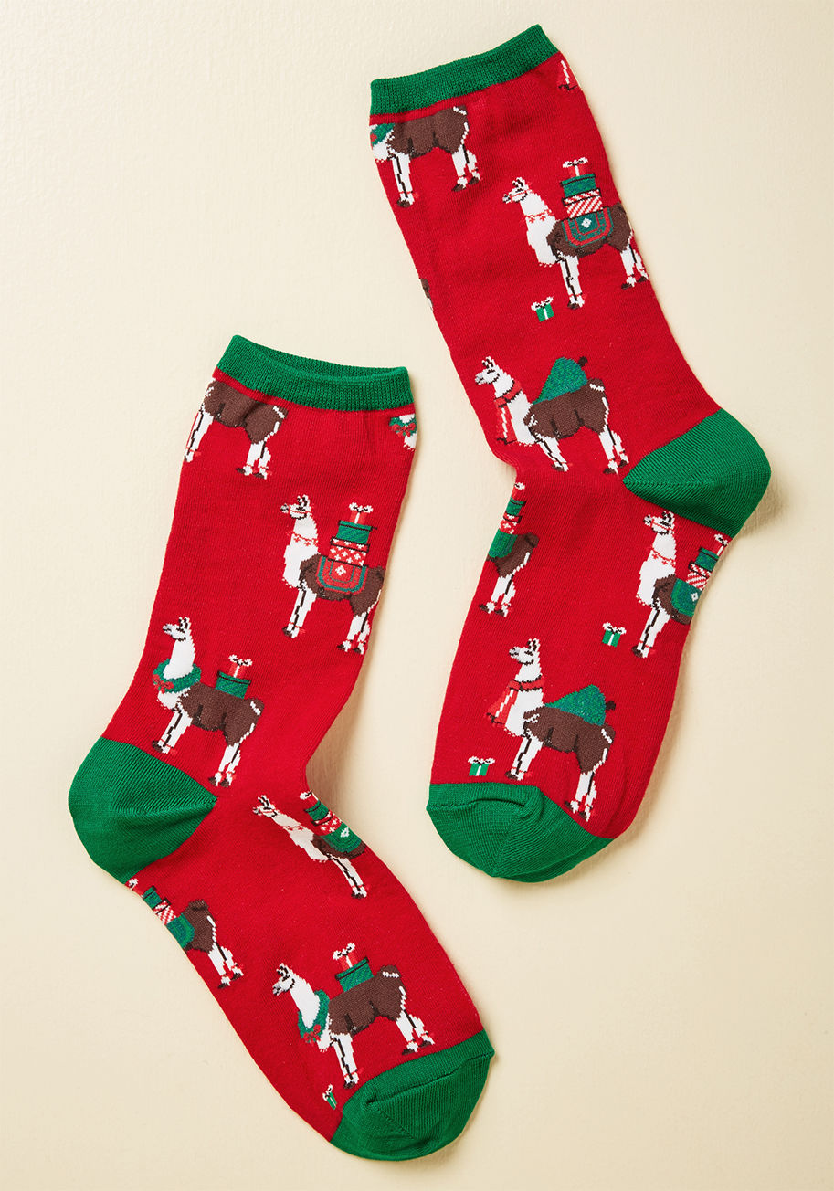 Wnc915 - If these Christmas socks are on your bestie's wish list, excellent! But, if she's unaware that such festive crews exist, she'll still be thrilled to receive this patterned pair, whose green toe caps and llamas toting gifts and trees will make her spirit b