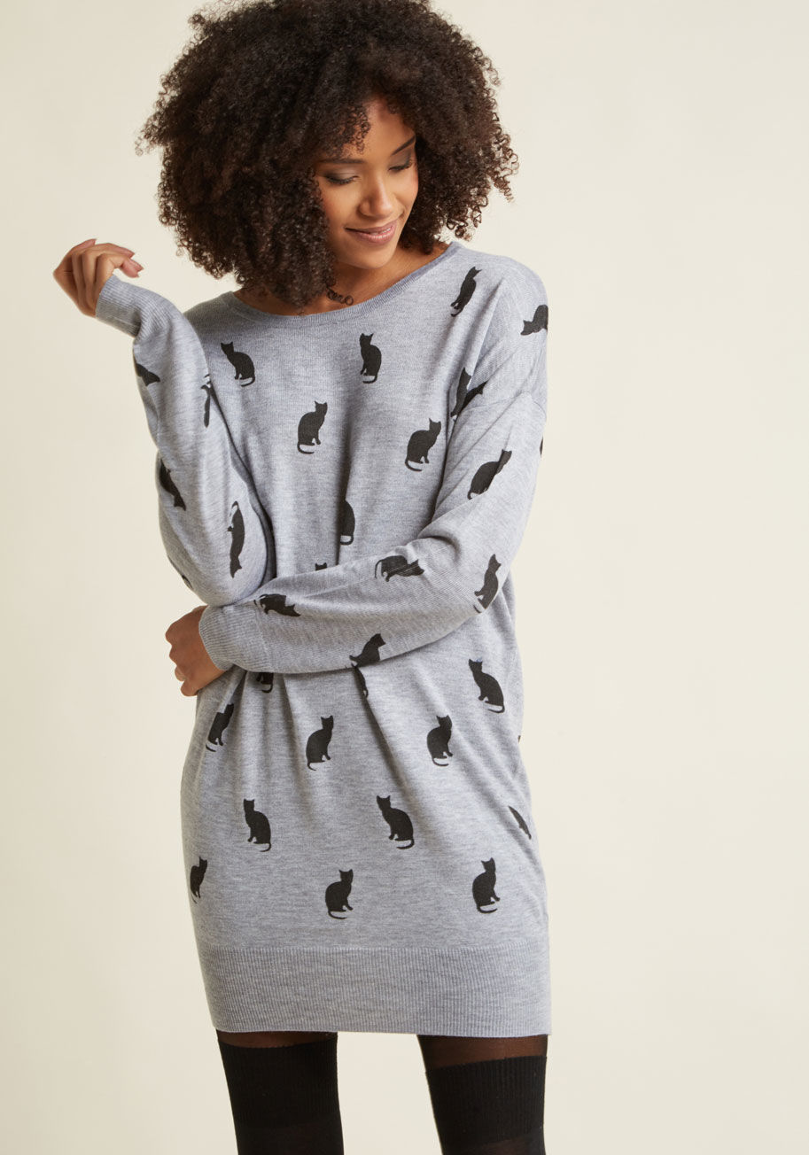 YK000740 - Of all the emotions this grey sweater dress elicits, unbridled delight is our favorite of all! A cozy-meets-quirky offering from Yumi, this knit number will generate a response from the wearer and admirers alike via its subtle dolman sleeves, black kitty 